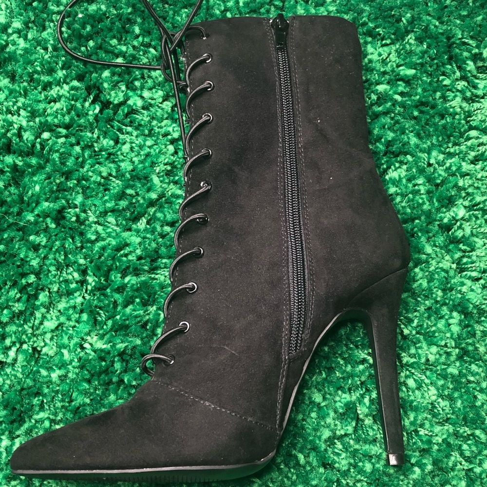 Never worn black a bit pass the ankle boots
